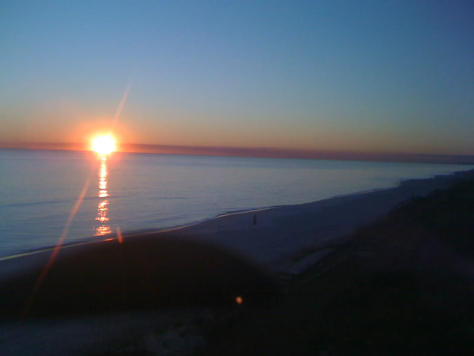 coucher de soleil sur le golfe du Mexique depuis la plage de Santa Rosa Beach