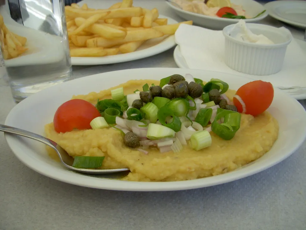 Santorini fava topped with capers, onion and tomato