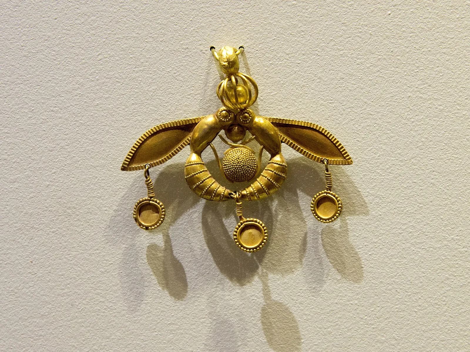 The Malia bee pendant