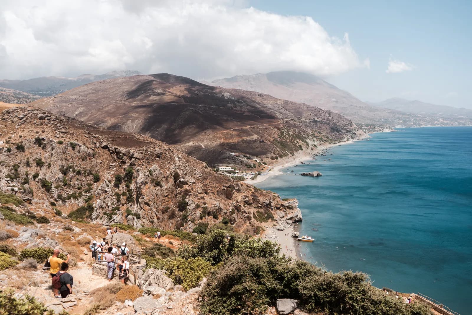 Walkers on the path above the south coast, heading down towards Preveli beach