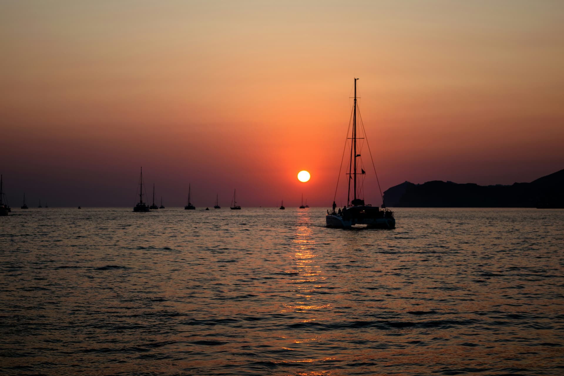 Sunset colours seen from the sea in Santorini