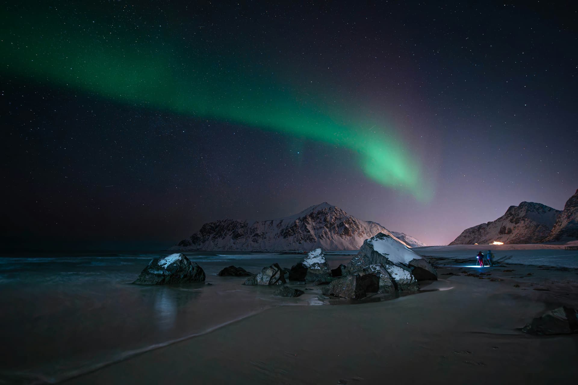 Northern lights above the mountains of the Lofoten Islands in Norway