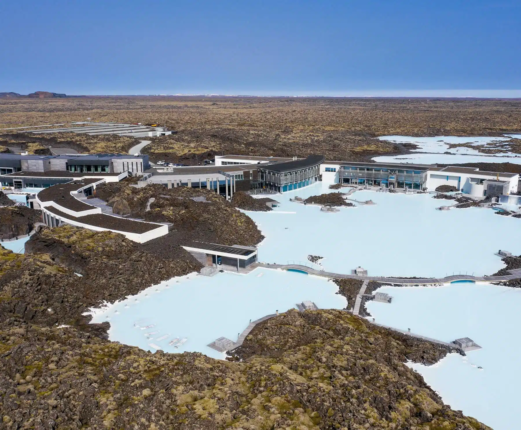 Visitors bathing in the milky blue waters of the Blue Lagoon