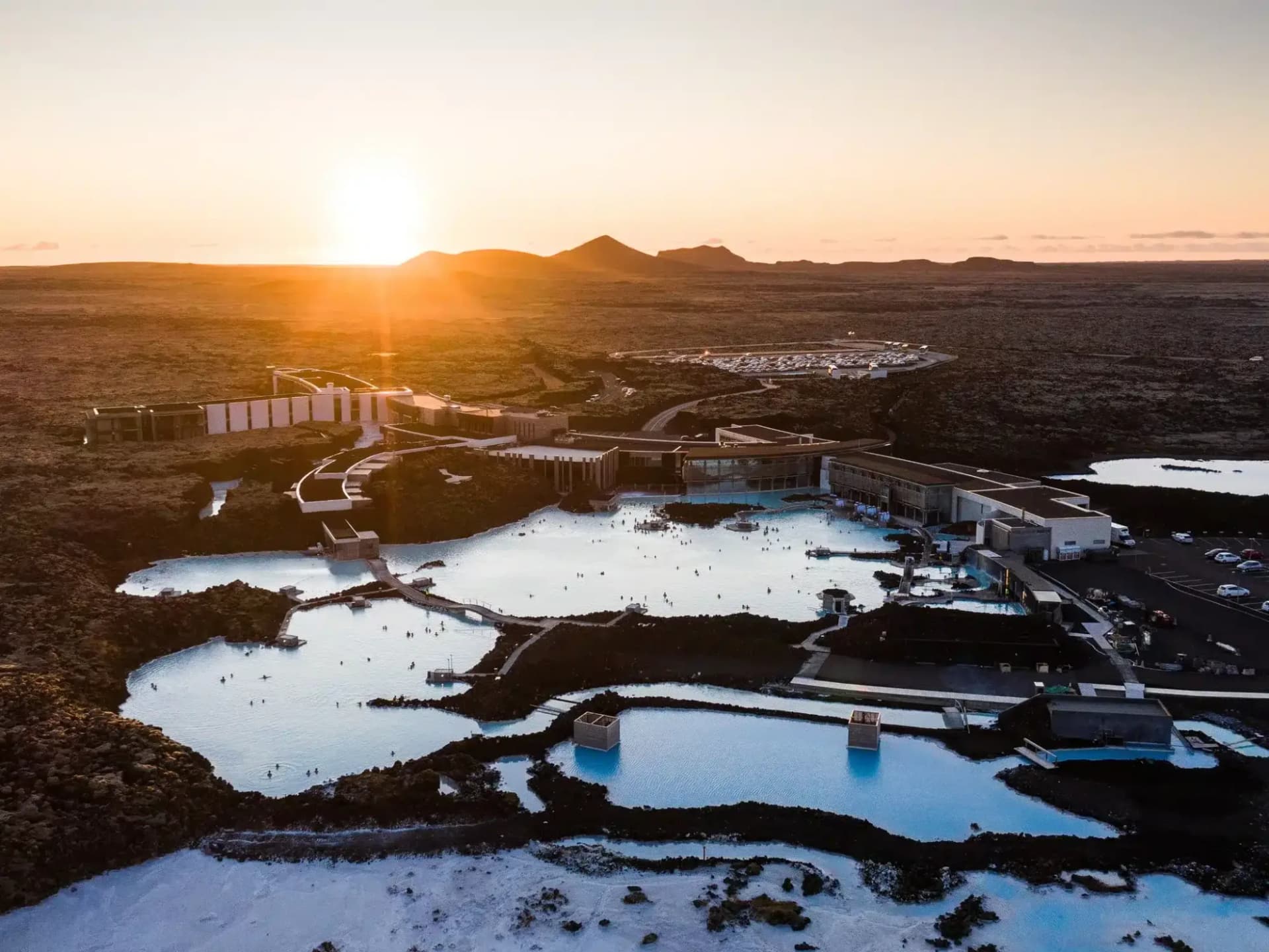 Visitors bathing in the milky blue waters of the Blue Lagoon
